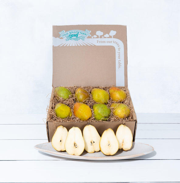 Green pears attractively displayed in a gift box