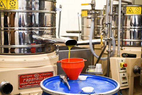 Freshly pressed olive oil coming out of the mill